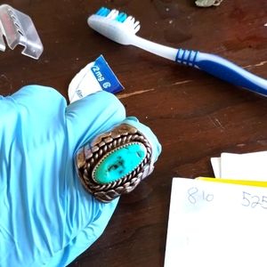 I'm selling the custom sterling silver ring with the turquoise stone Navajo Indi